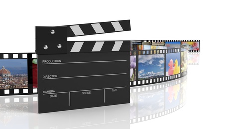 Clapperboard and filmstrip with pictures isolated on white background